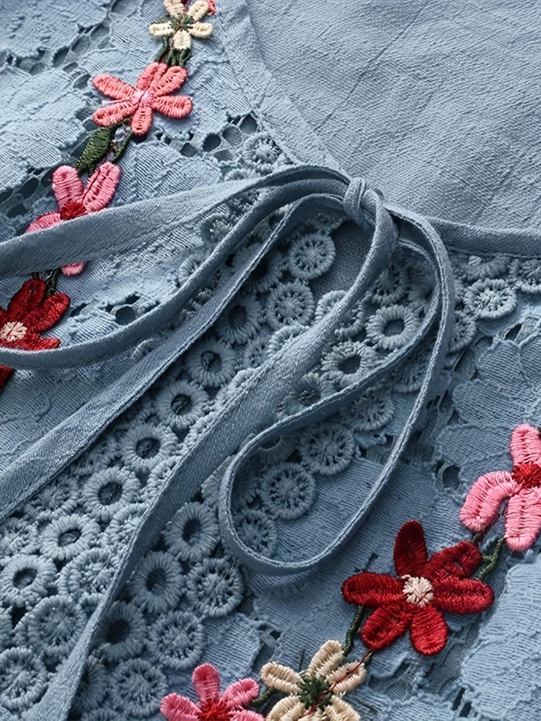 Camicetta elegante in pizzo patchwork con scollo a V