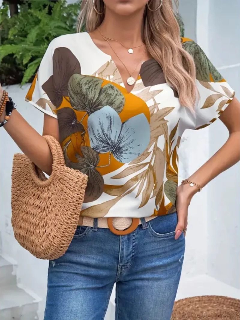 Camicetta Charis con bottoni floreali