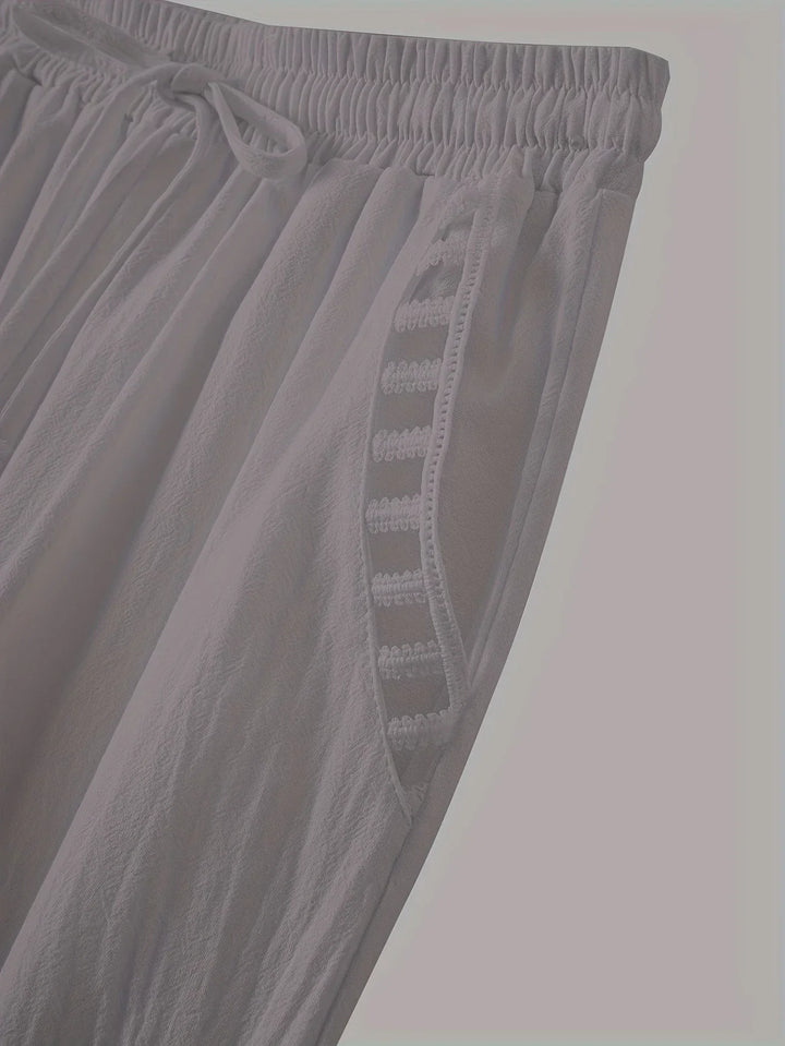 Pantaloni cropped Tracey con finiture a contrasto
